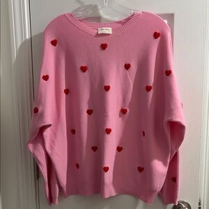 Chic Pink Sweater with Heart Details